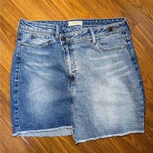 Guess Y2K asymmetrical jean mini skirt raw hem size large.